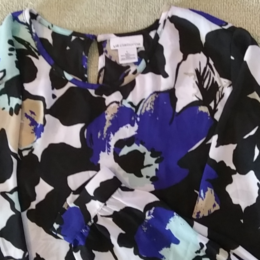 A LIZ CLAIBORNE BLOUSE .